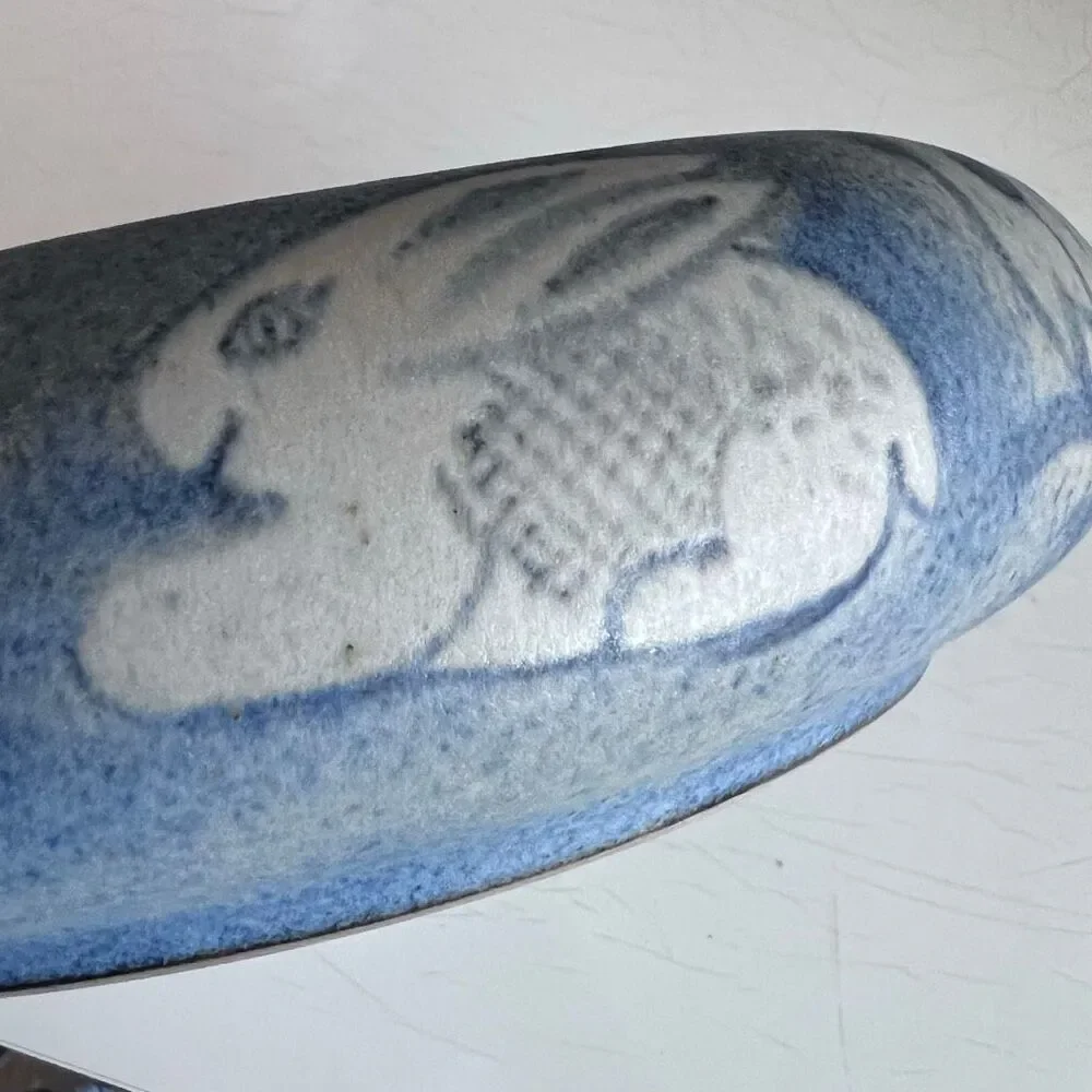 North Eagle Pottery hand-thrown and features a matte or glazed finish in blue an